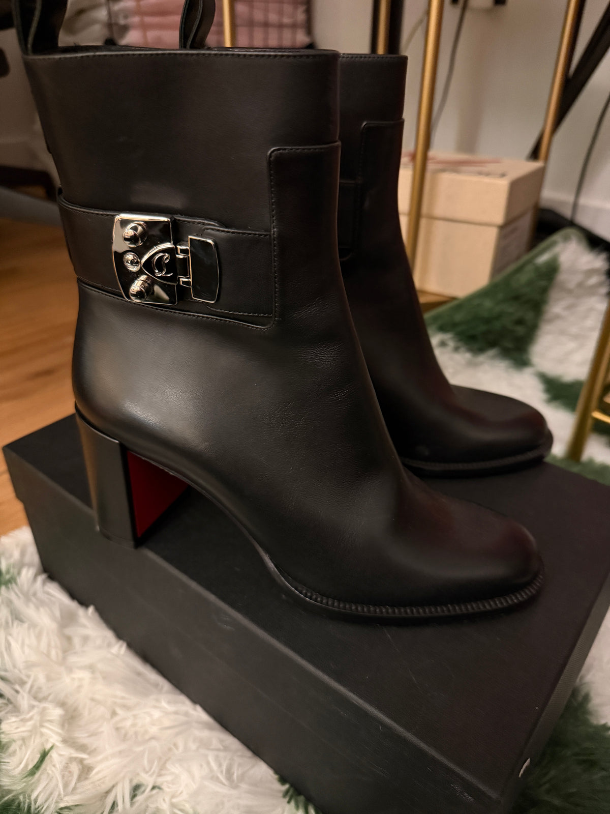 CHRISTIAN LOUBOUTIN LOCK BOOTS